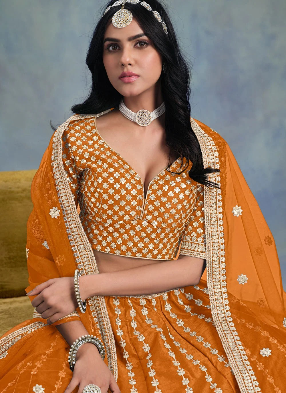Radiant orange haldi lehenga in art silk with soft net dupatta