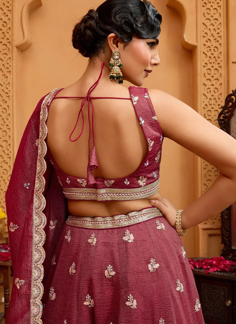 Opulent rosegold tissue lehenga with sequin stone embroidery