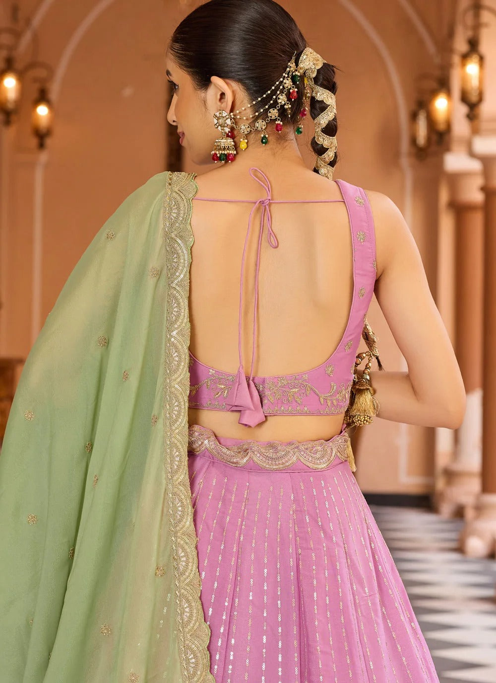 Pink ring ceremony lehenga in tissue silk with zari sequins embroidery