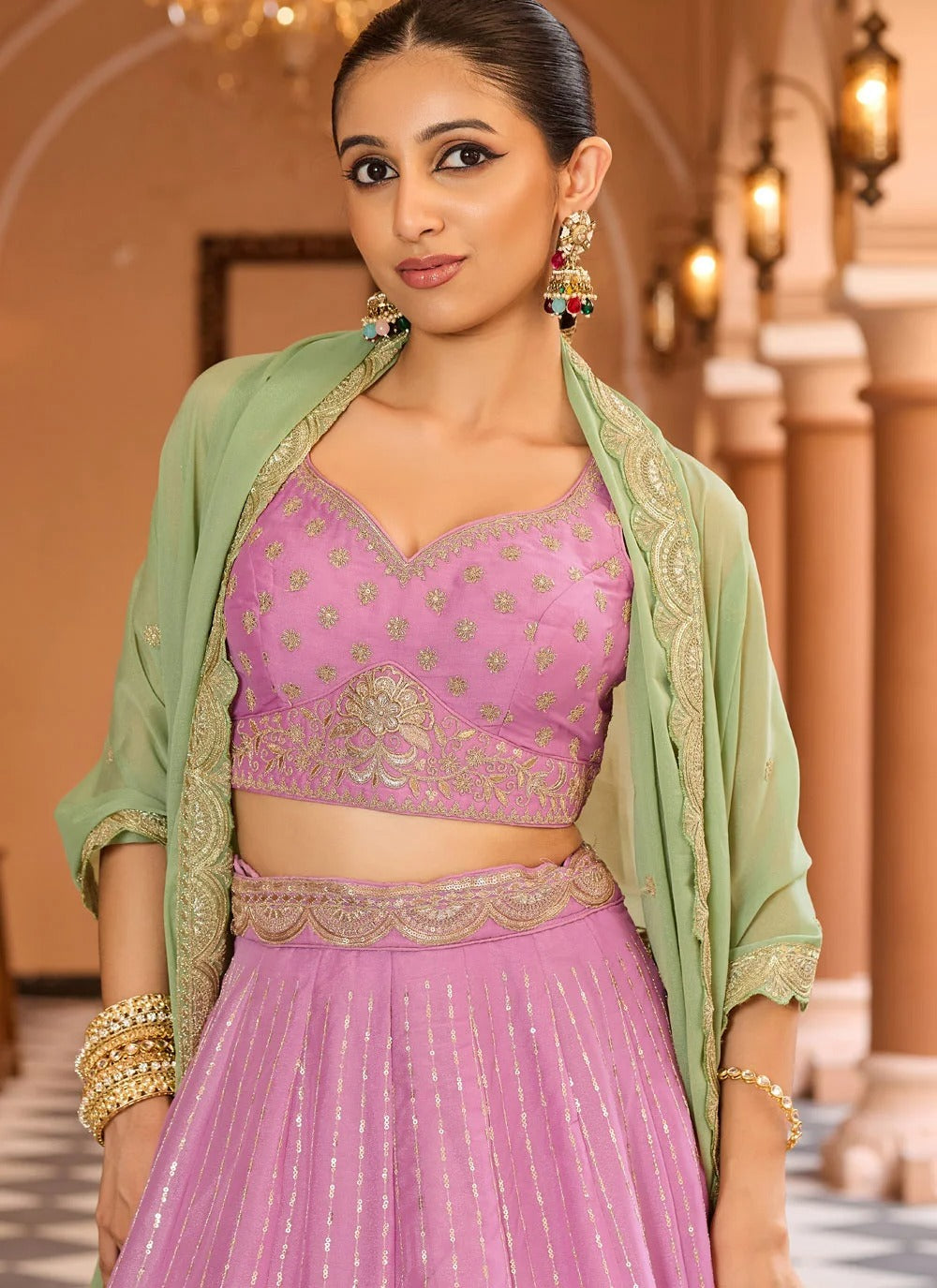Pink ring ceremony lehenga in tissue silk with zari sequins embroidery