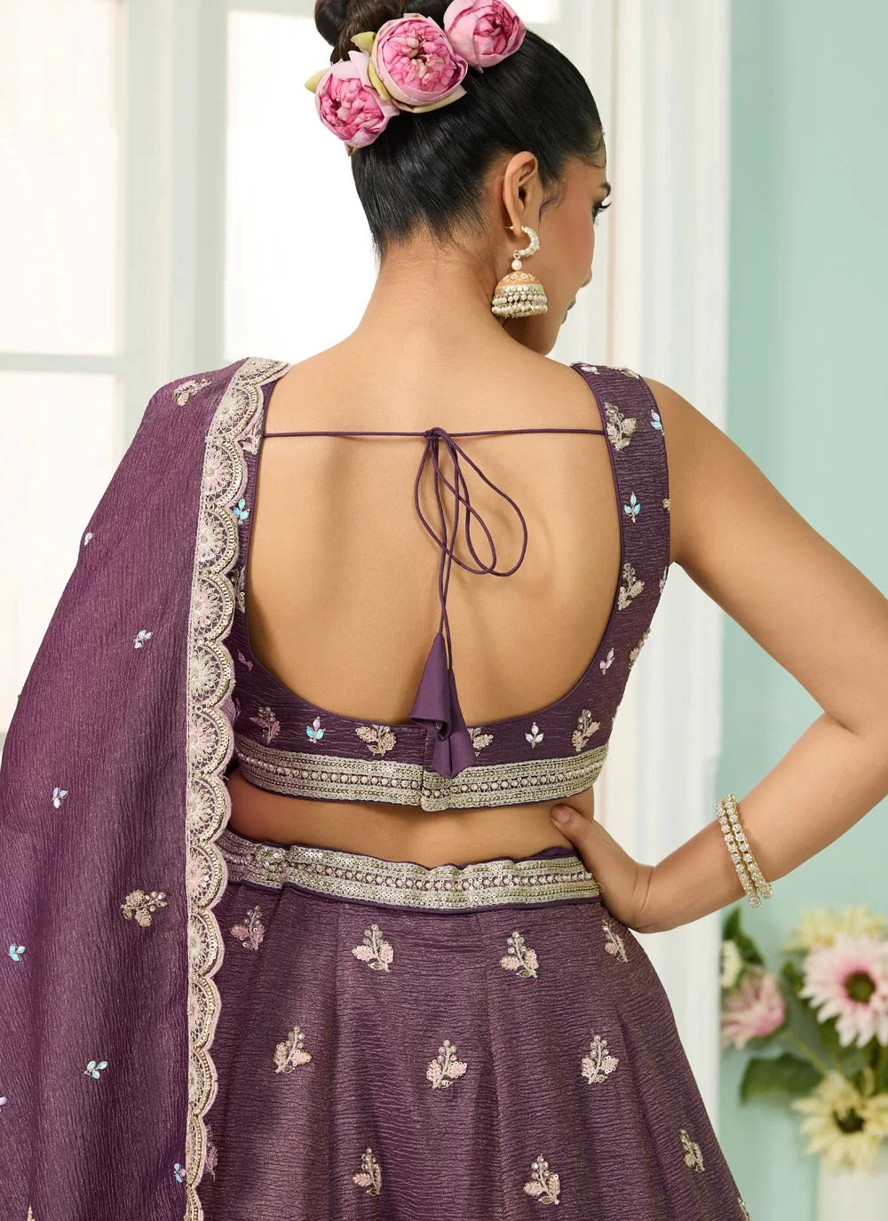 Enchanting purple tissue lehenga with sequin stone embroidery