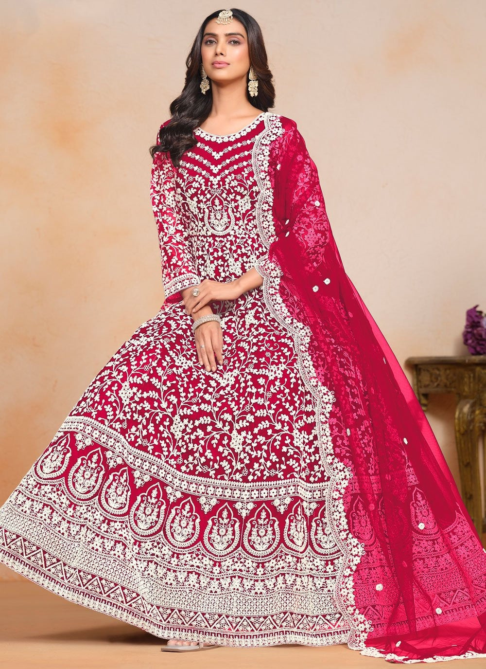 Radiant rani pink anarkali suit in net with embroidered dupatta