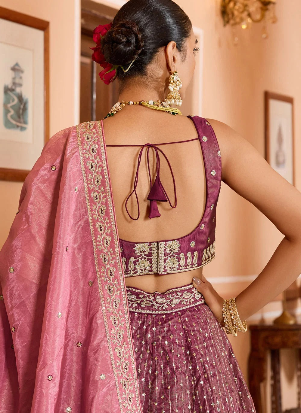 Luxury rose gold engagement lehenga in tissue silk with zari embroidery