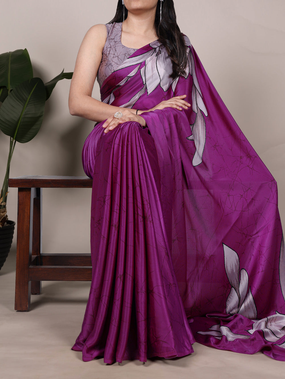 Pink satin silk saree with floral print lavender blouse