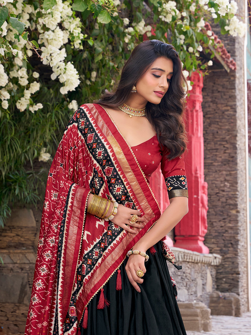 Black color patola printed tasar silk lehenga choli
