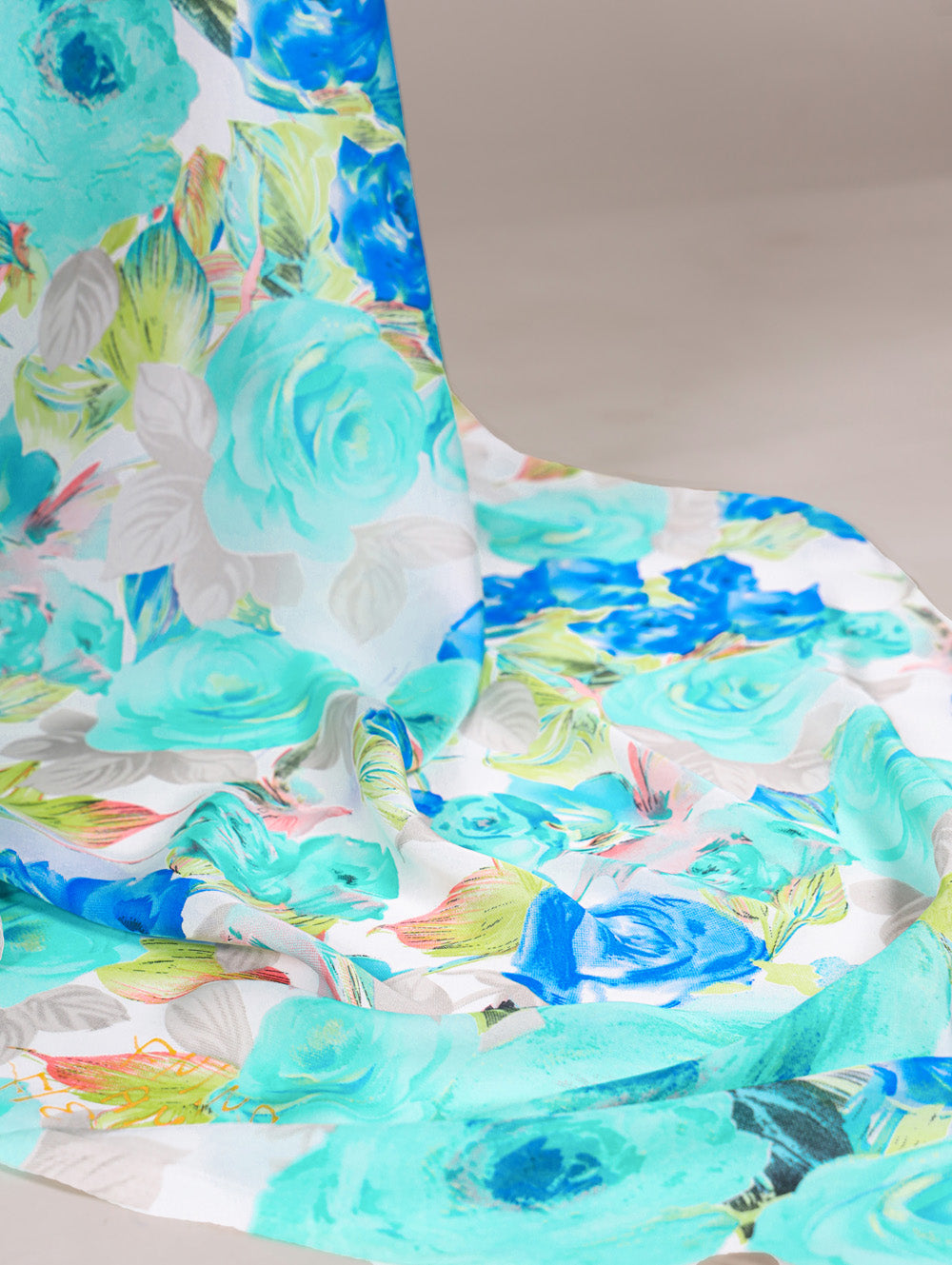 Firozi dull satin floral printed saree with matching blouse and pearl lace border