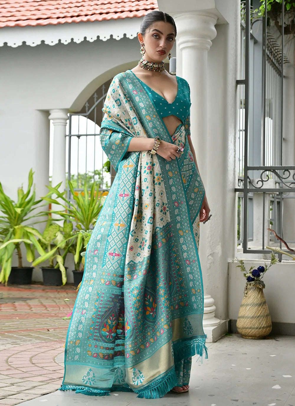Sea green banarasi silk patola saree with ajrakh zari weaving pallu