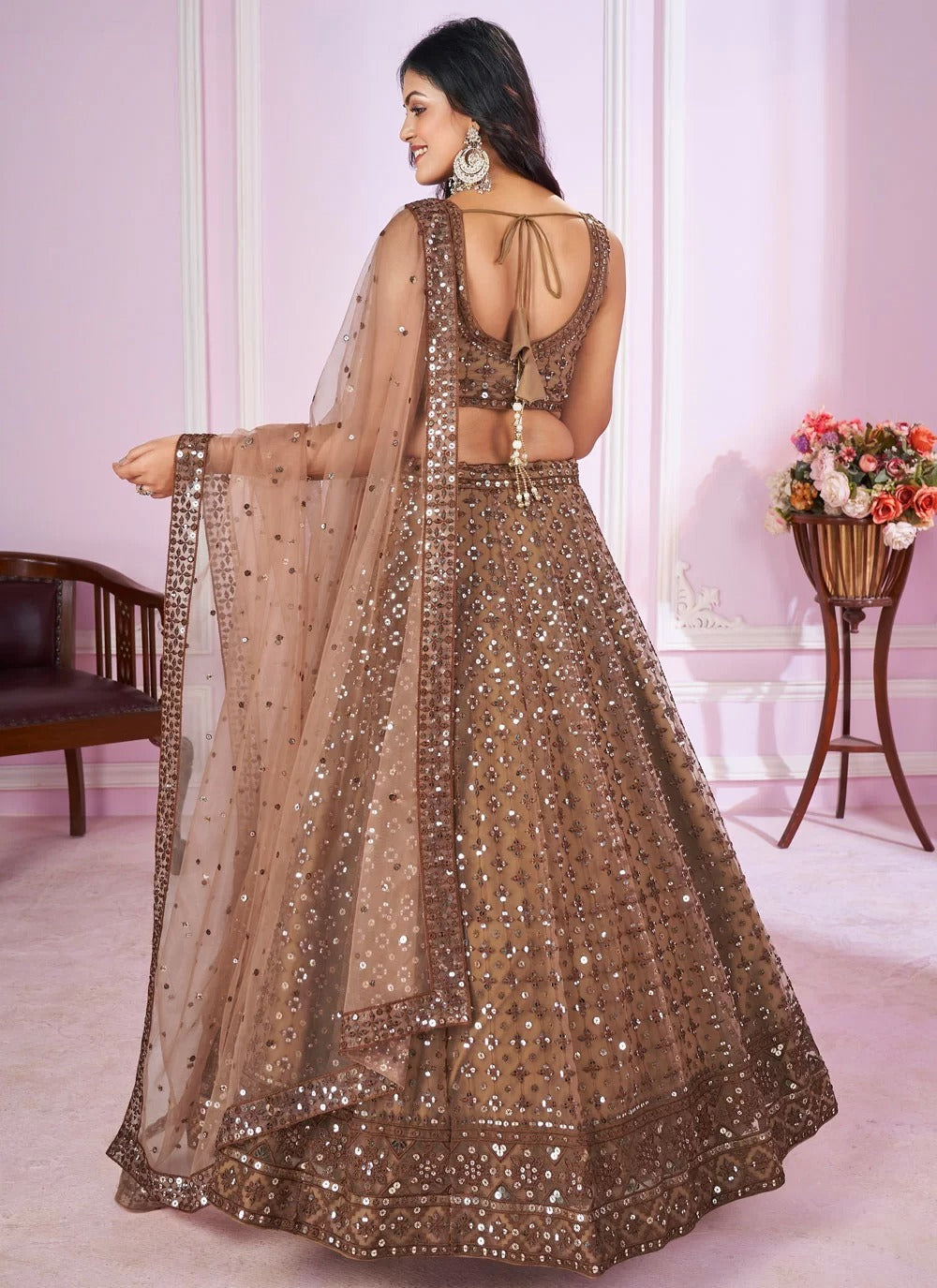 Traditional brown soft net lehenga choli with sequins thread embroidery