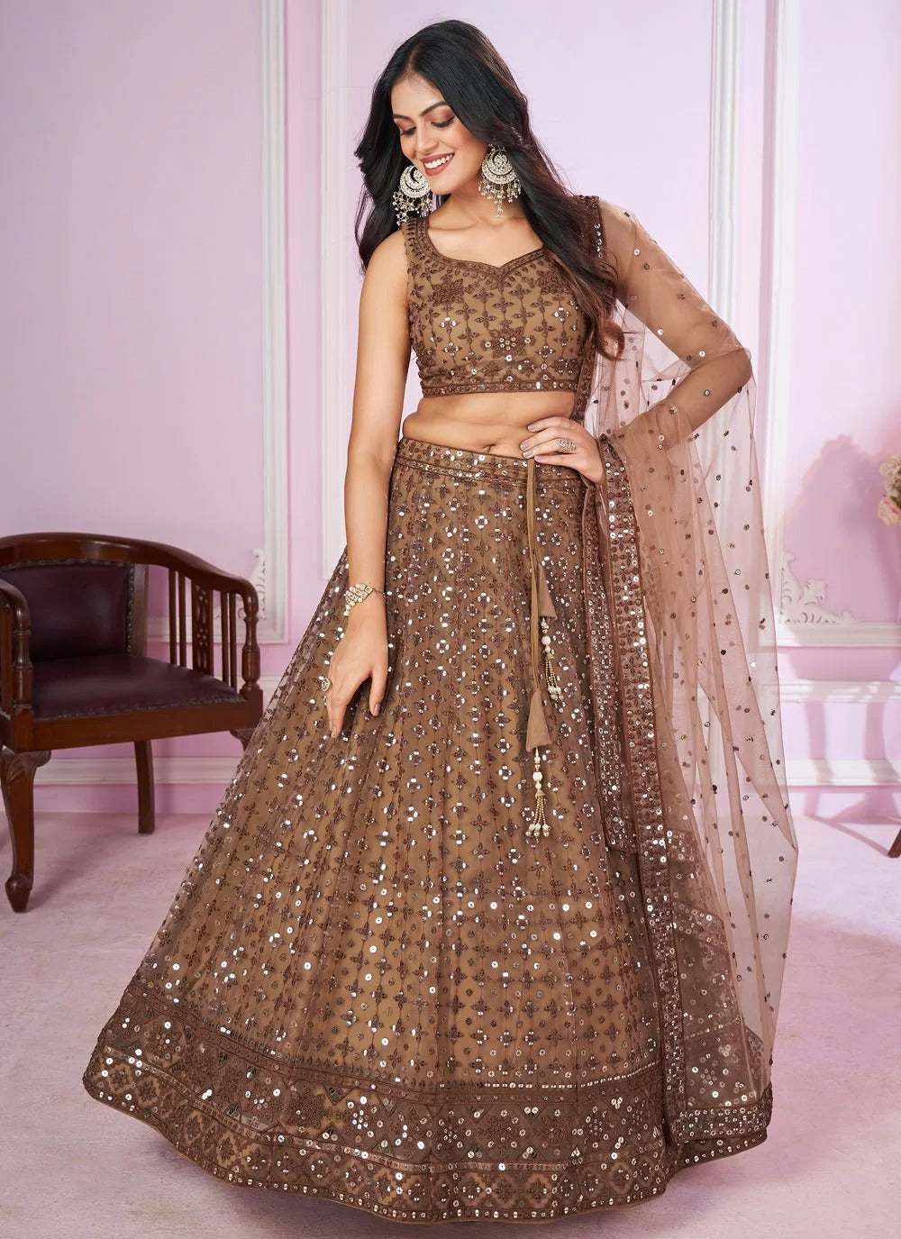 Traditional brown soft net lehenga choli with sequins thread embroidery