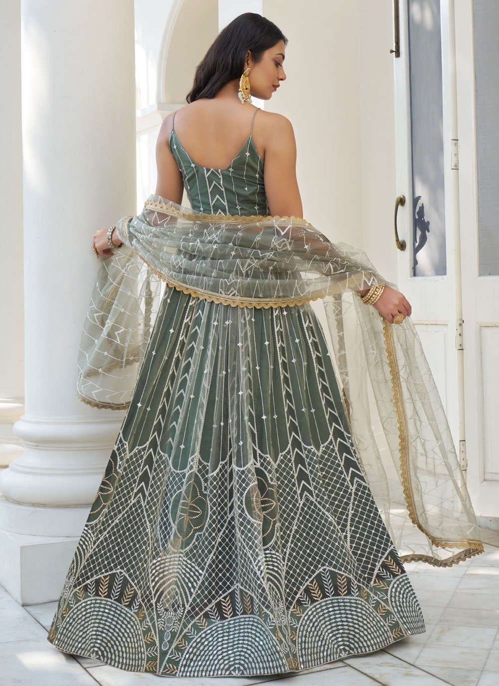 Elegant dusty green butterfly net party wear lehenga set