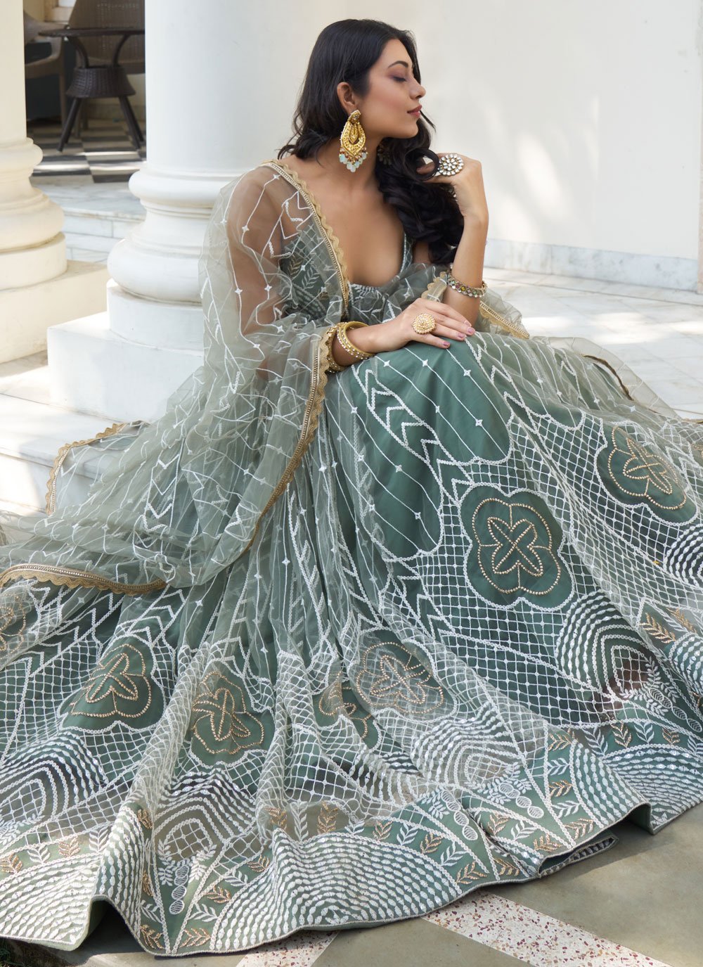 Elegant dusty green butterfly net party wear lehenga set