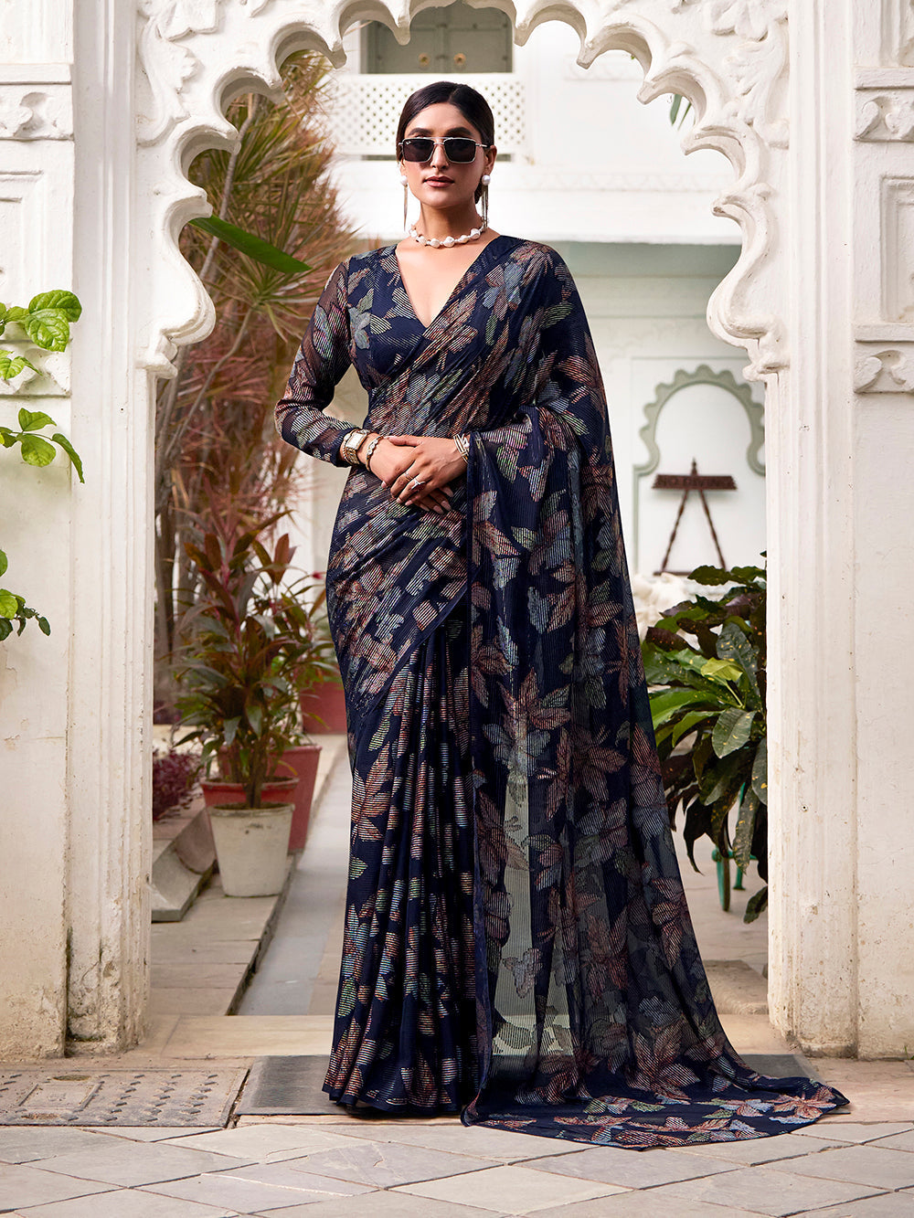 Navy blue lurex brasso saree with floral viscose work matching blouse