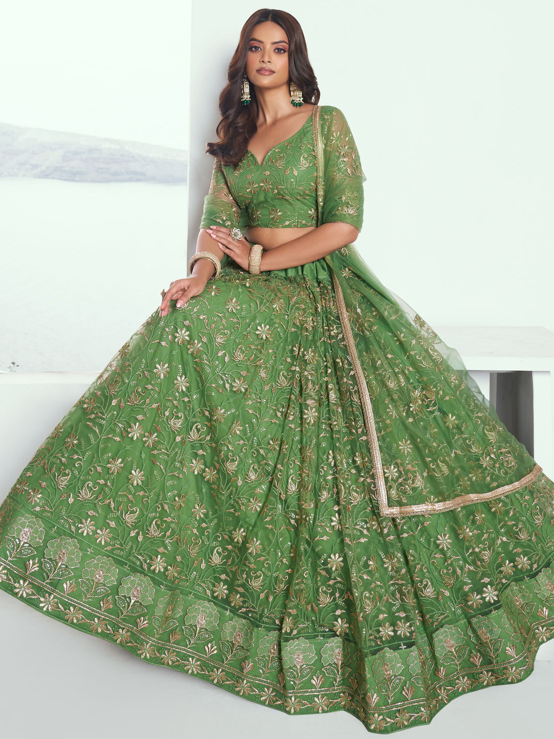 Elegant Green Embroidered Net Mehendi Lehenga Choli