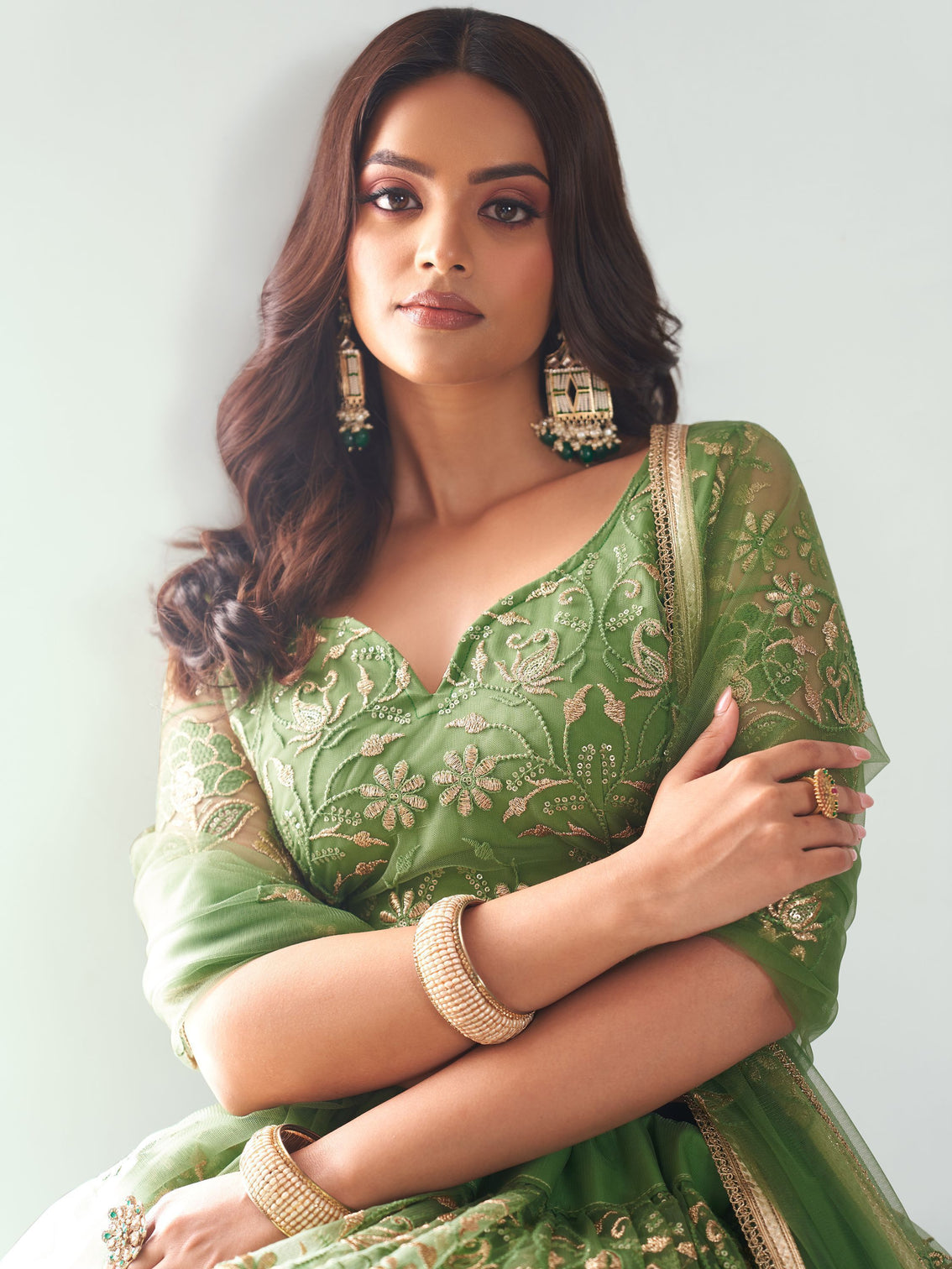 Elegant Green Embroidered Net Mehendi Lehenga Choli