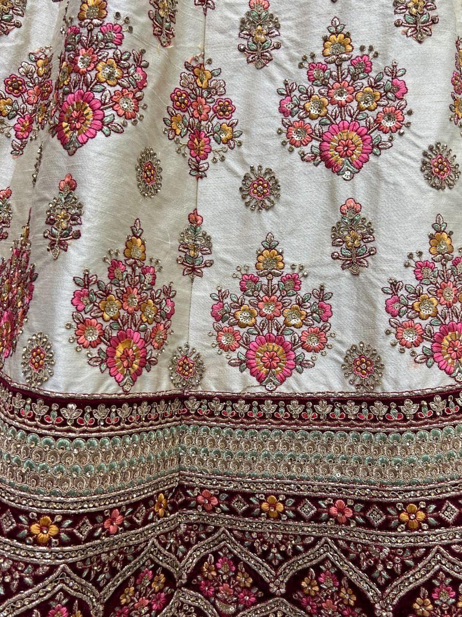 Elegant Off-white Embroidered Silk Wedding Wear Lehenga Choli