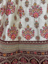 Elegant Off-white Embroidered Silk Wedding Wear Lehenga Choli
