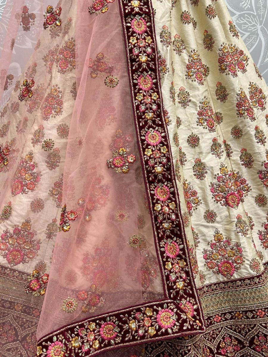 Elegant Off-white Embroidered Silk Wedding Wear Lehenga Choli