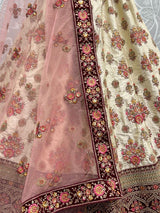 Elegant Off-white Embroidered Silk Wedding Wear Lehenga Choli