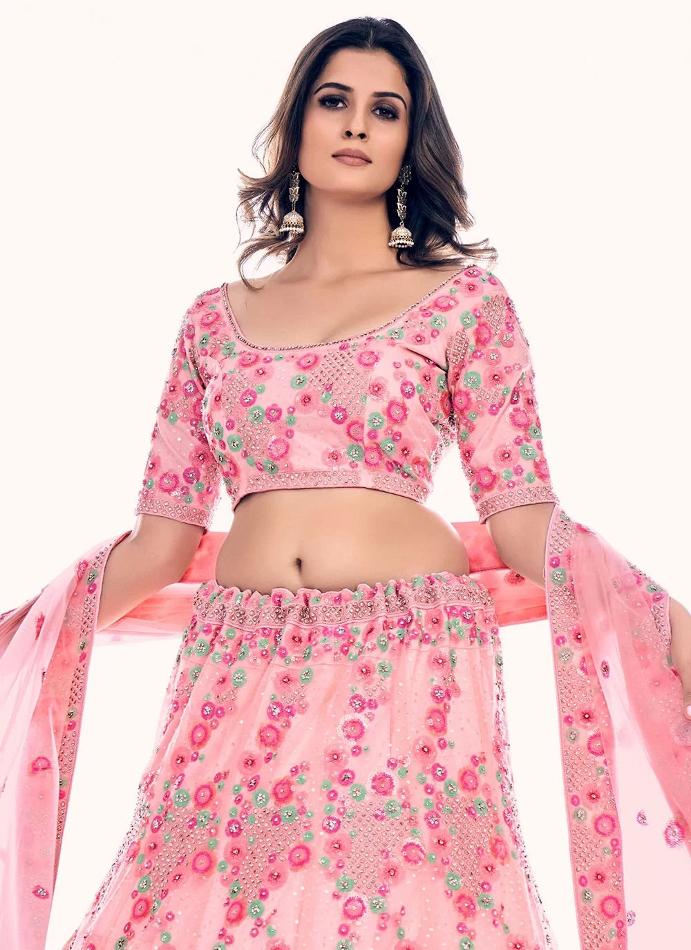 Elegant peach soft net lehenga with zarkan and thread work