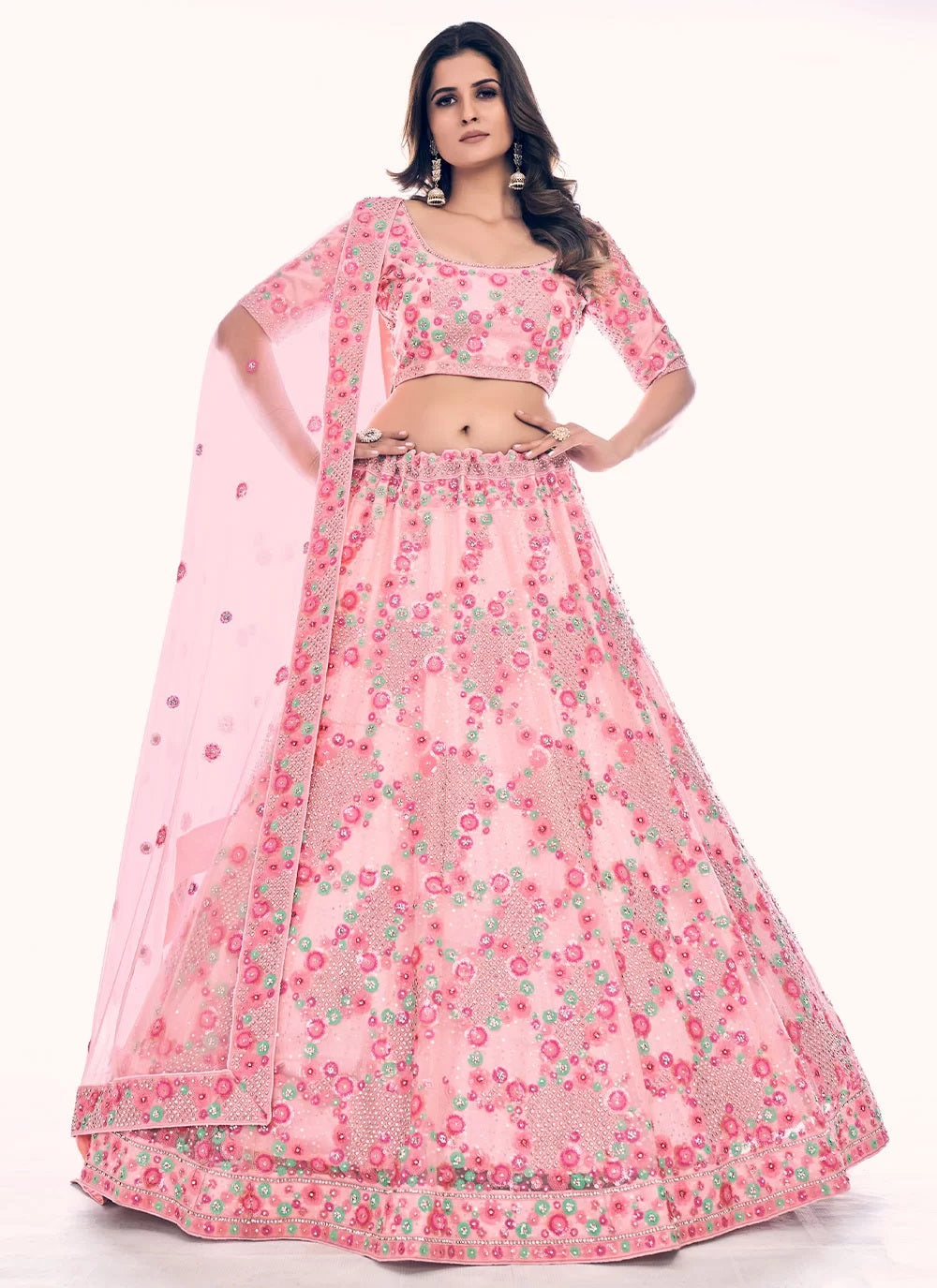 Elegant peach soft net lehenga with zarkan and thread work