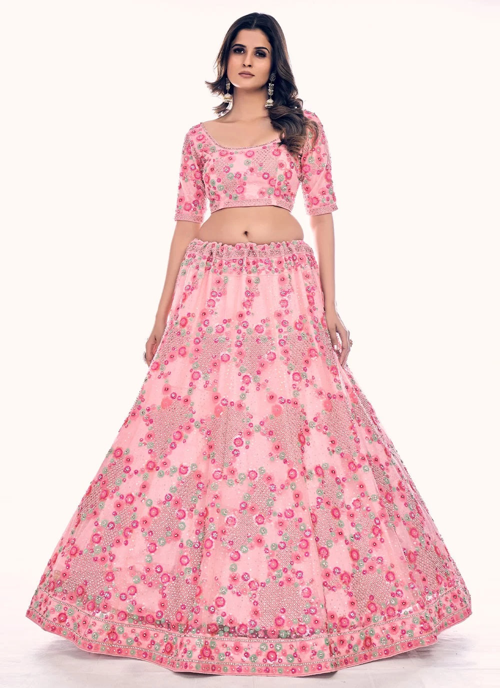 Elegant peach soft net lehenga with zarkan and thread work
