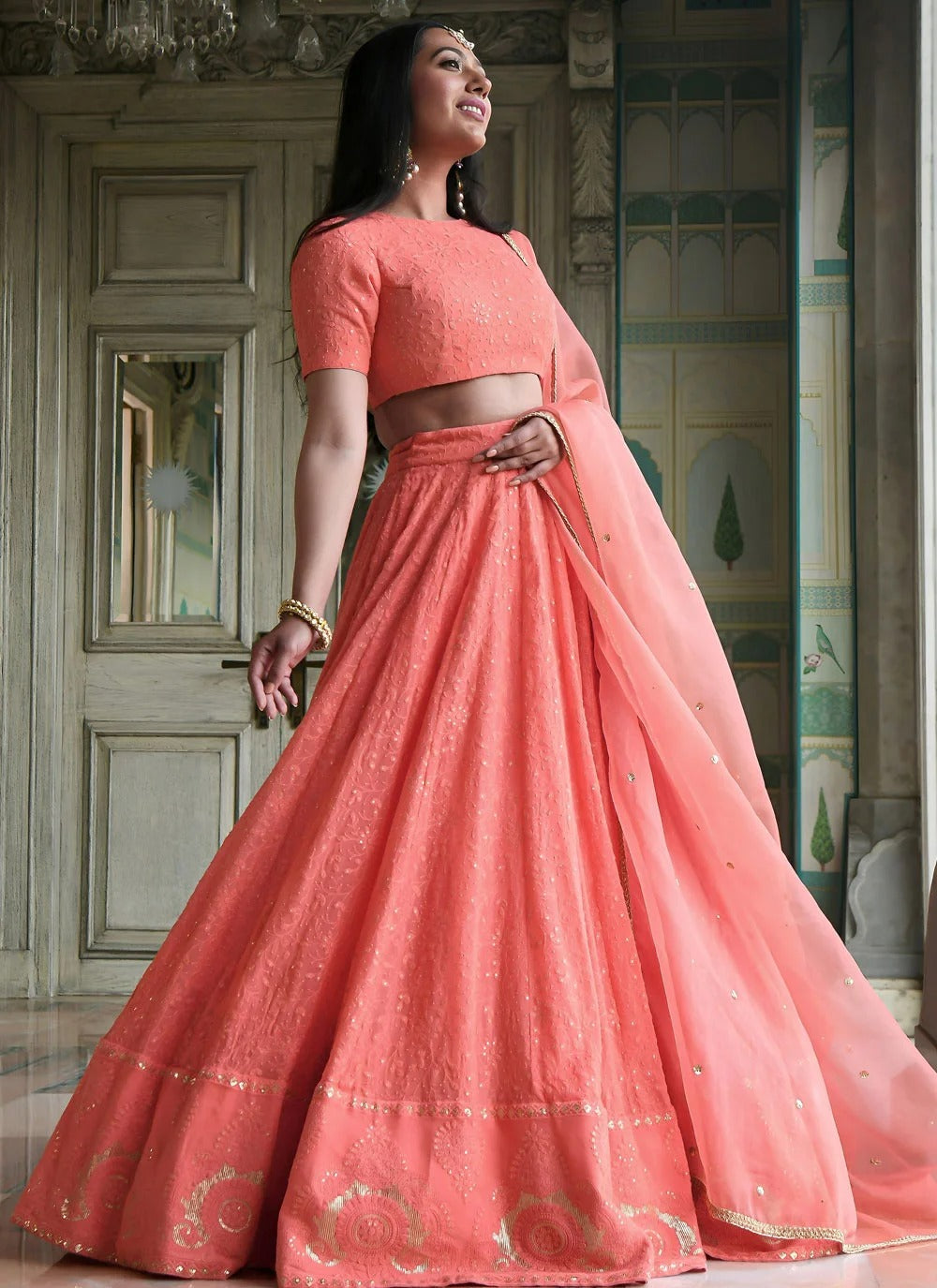Peach cocktail lehenga in georgette with gota patti embroidery
