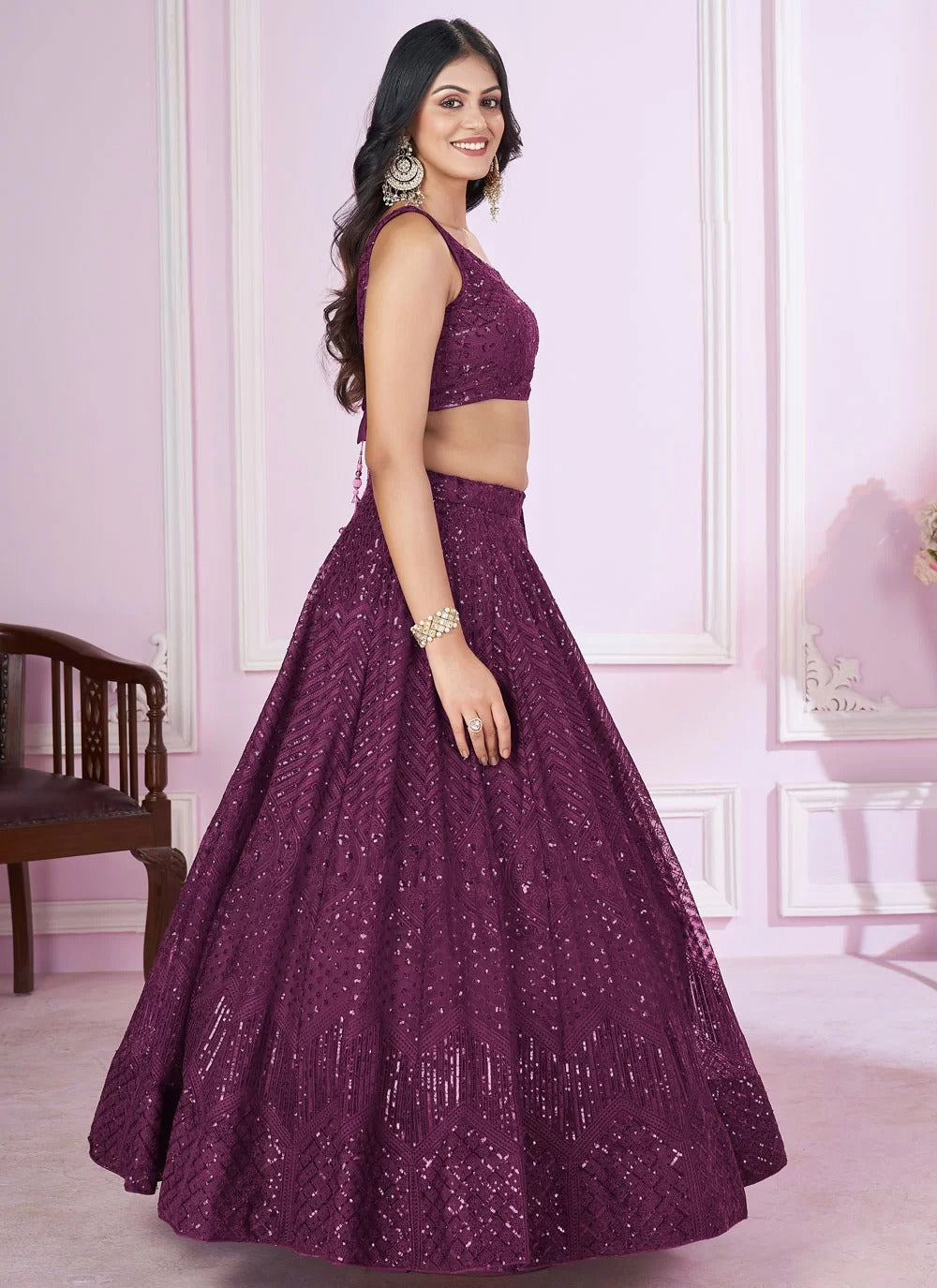 Elegant purple soft net engagement lehenga with sequins embroidery work