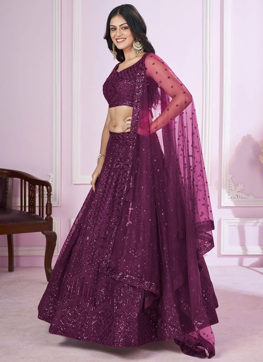 Elegant purple soft net engagement lehenga with sequins embroidery work