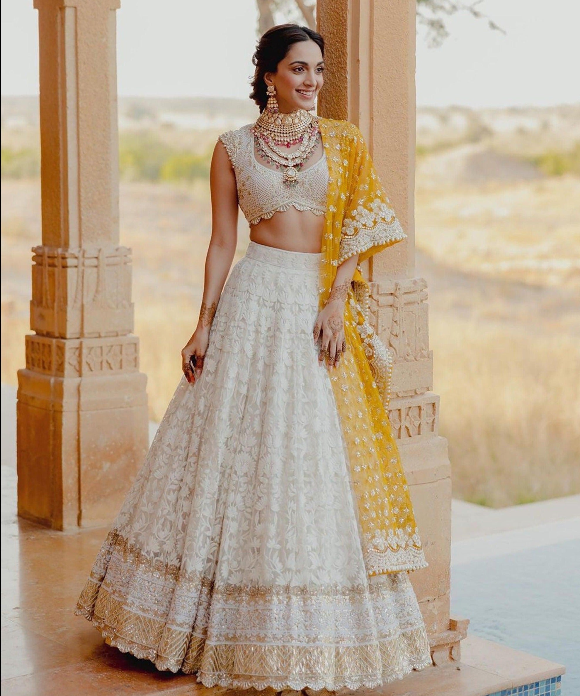 Elegant White Bridal Lehenga and Yellow Dupatta