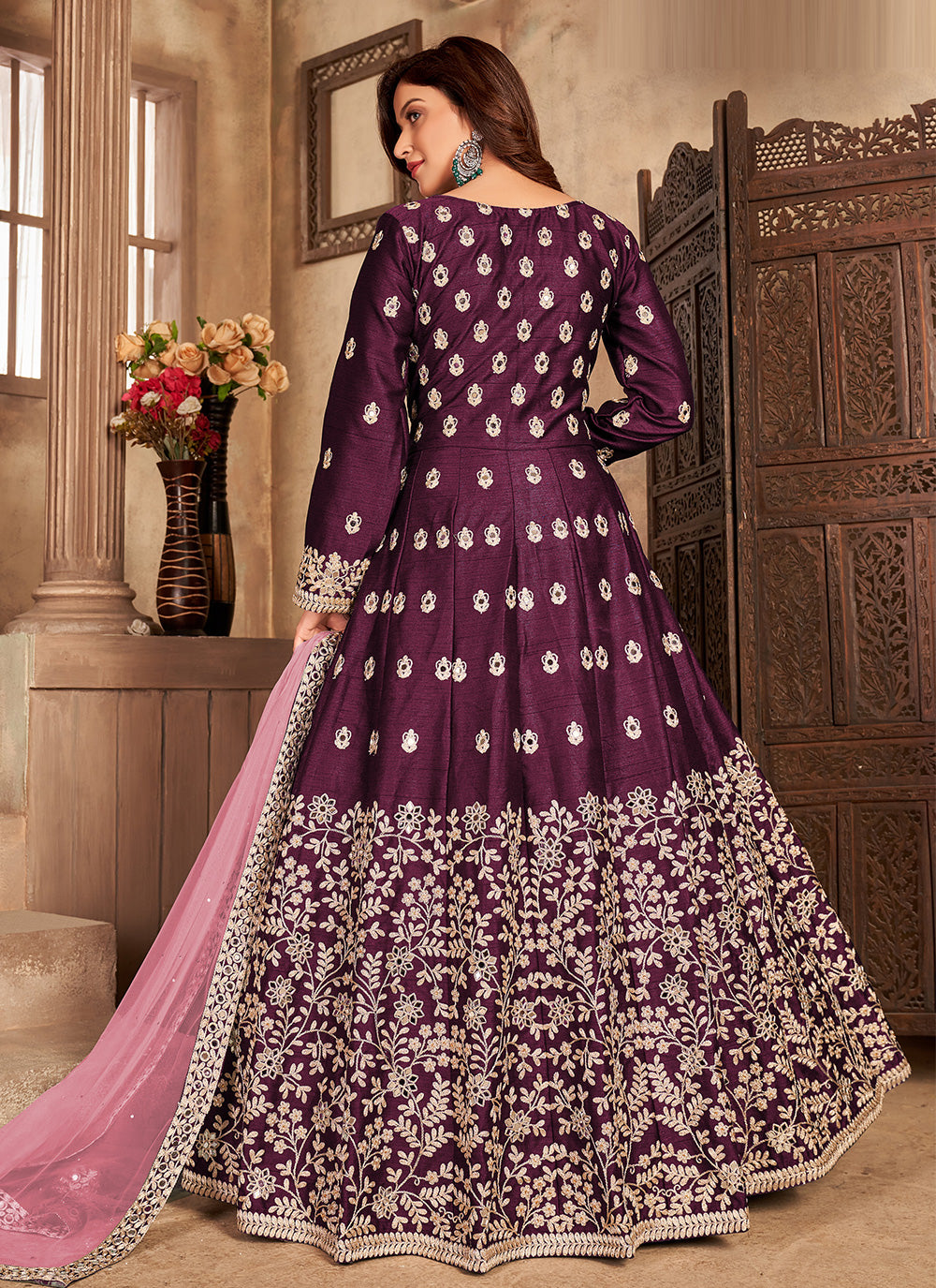 Embroidered art silk slitted abaya style suit in magenta