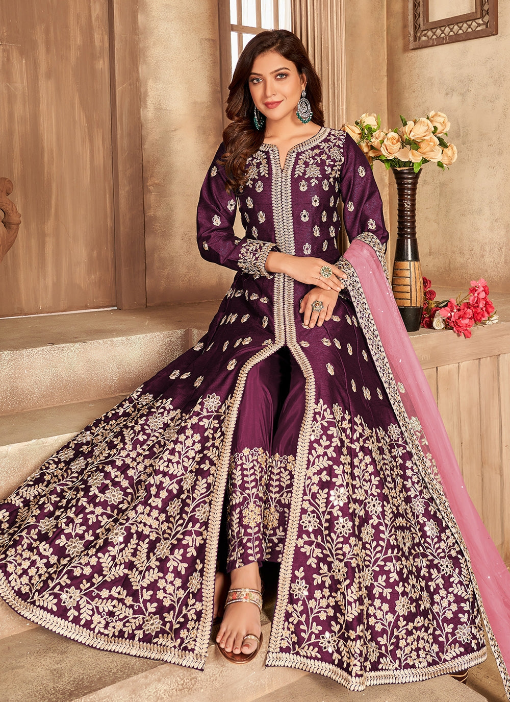 Embroidered art silk slitted abaya style suit in magenta