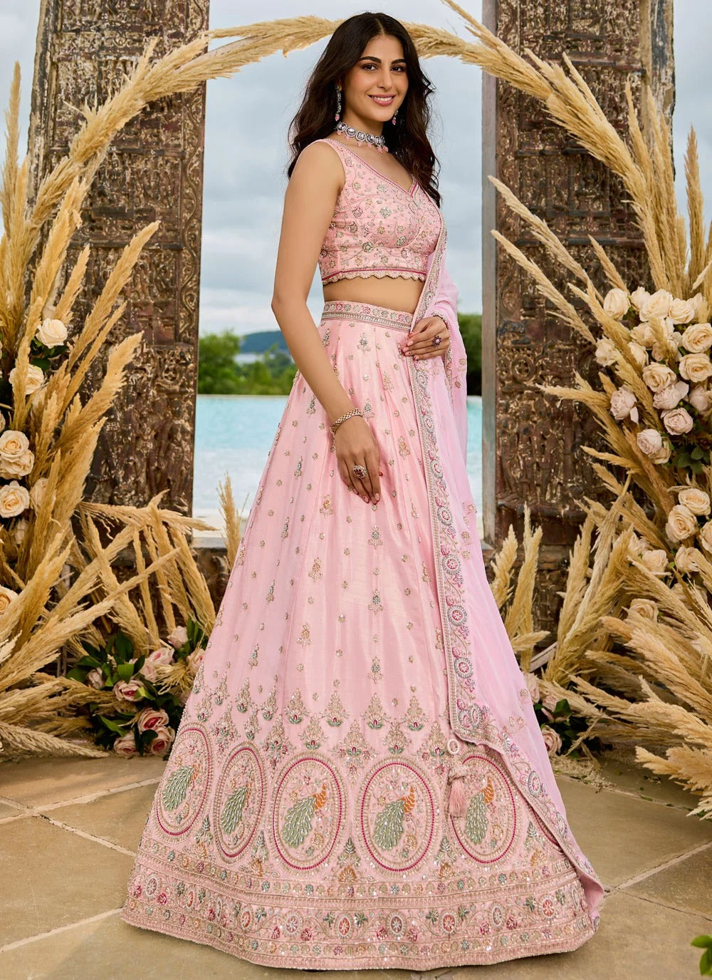 Blush pink silk reception lehenga with sequins coding embroidery