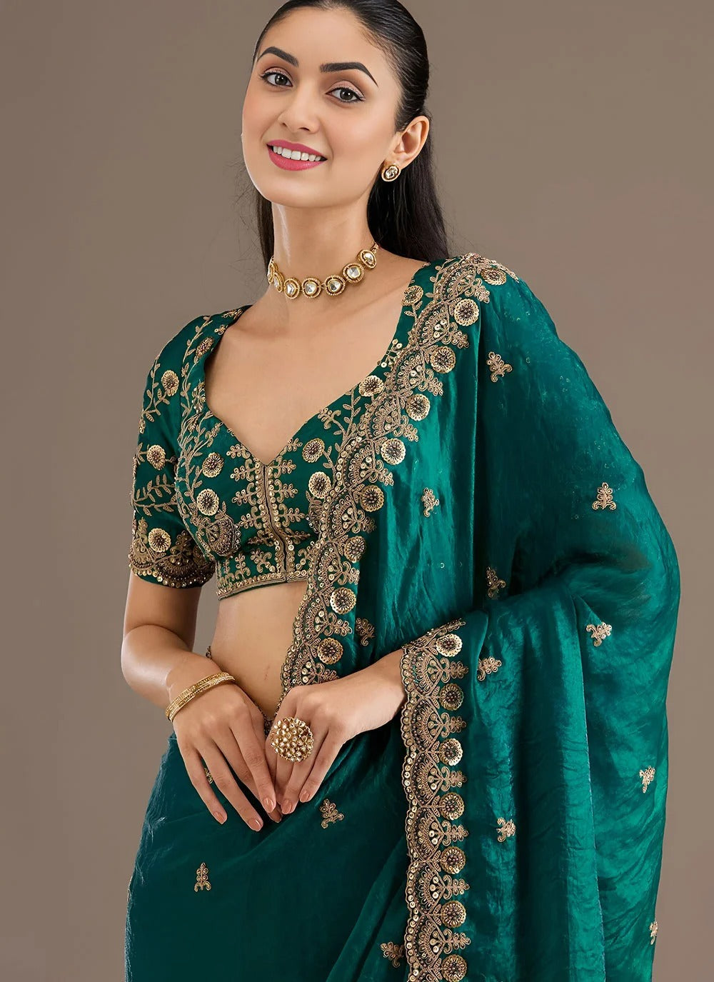 Graceful rama green designer tissue silk saree with zari dori diamond embroidery