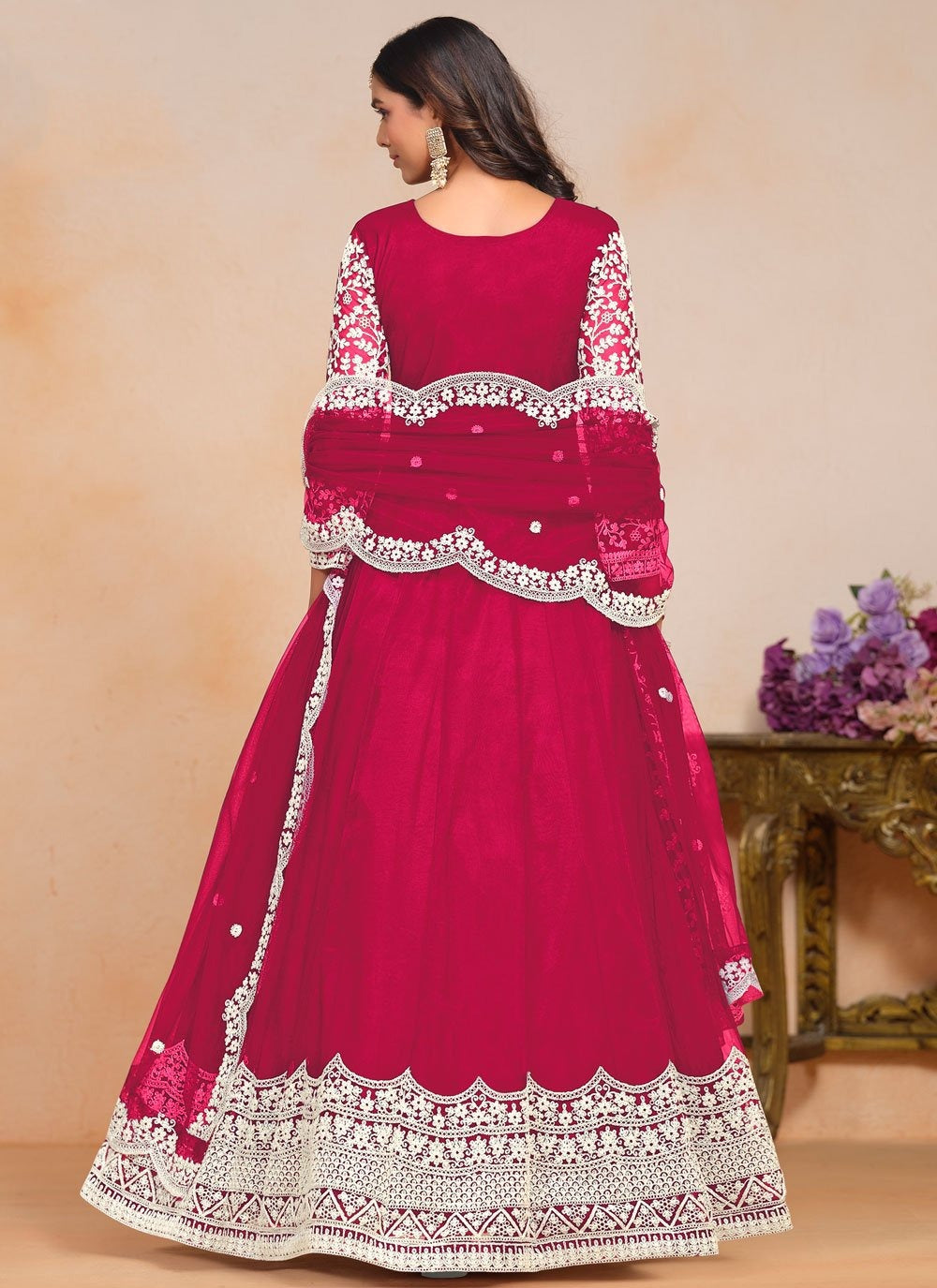 Radiant rani pink anarkali suit in net with embroidered dupatta