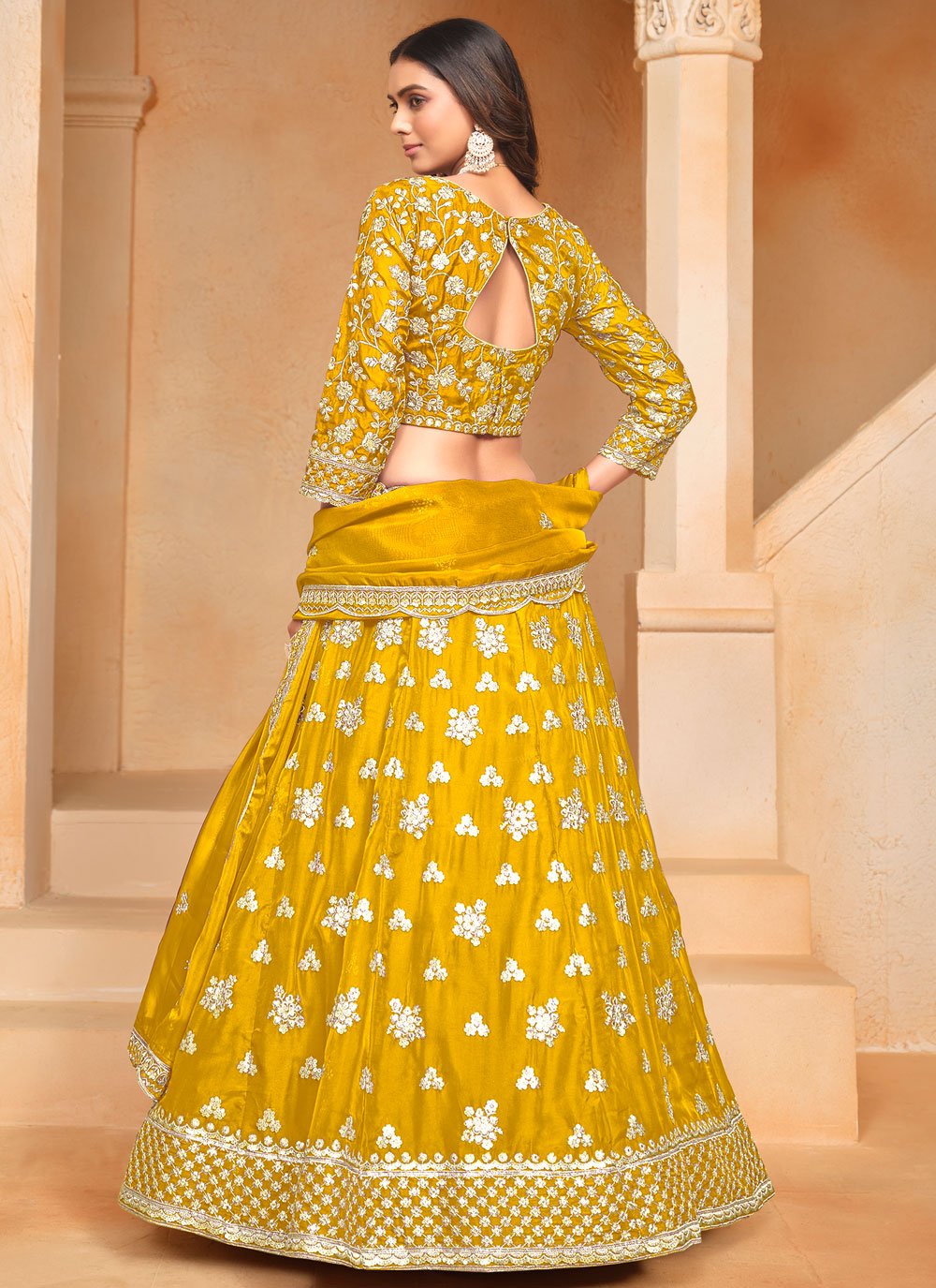 Yellow organza haldi special lehenga with embroidered dupatta