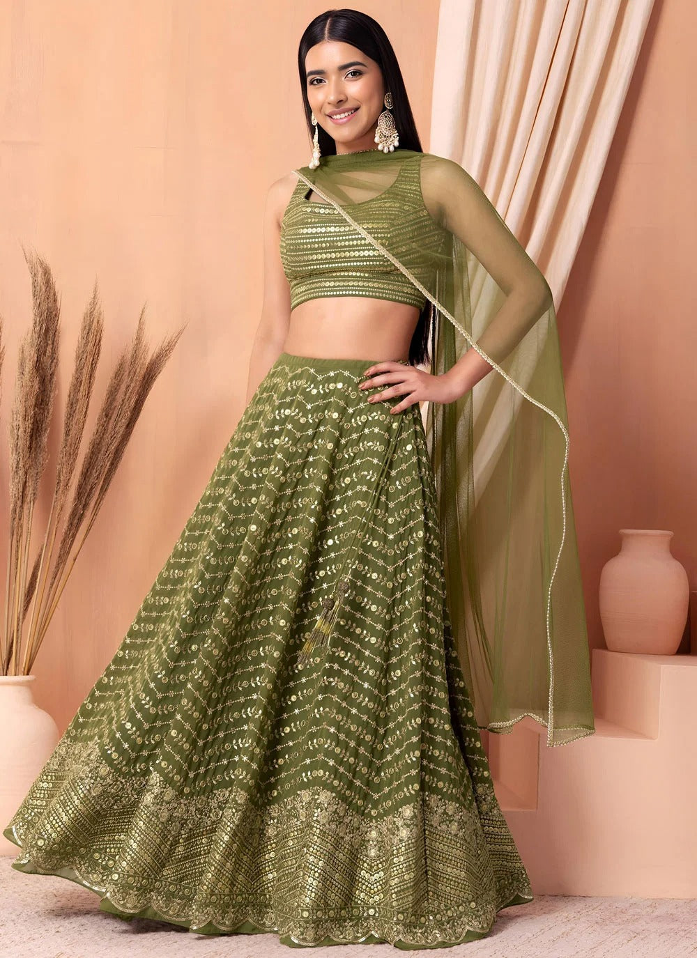 Emerald green engagement lehenga in georgette with sequins embroidery