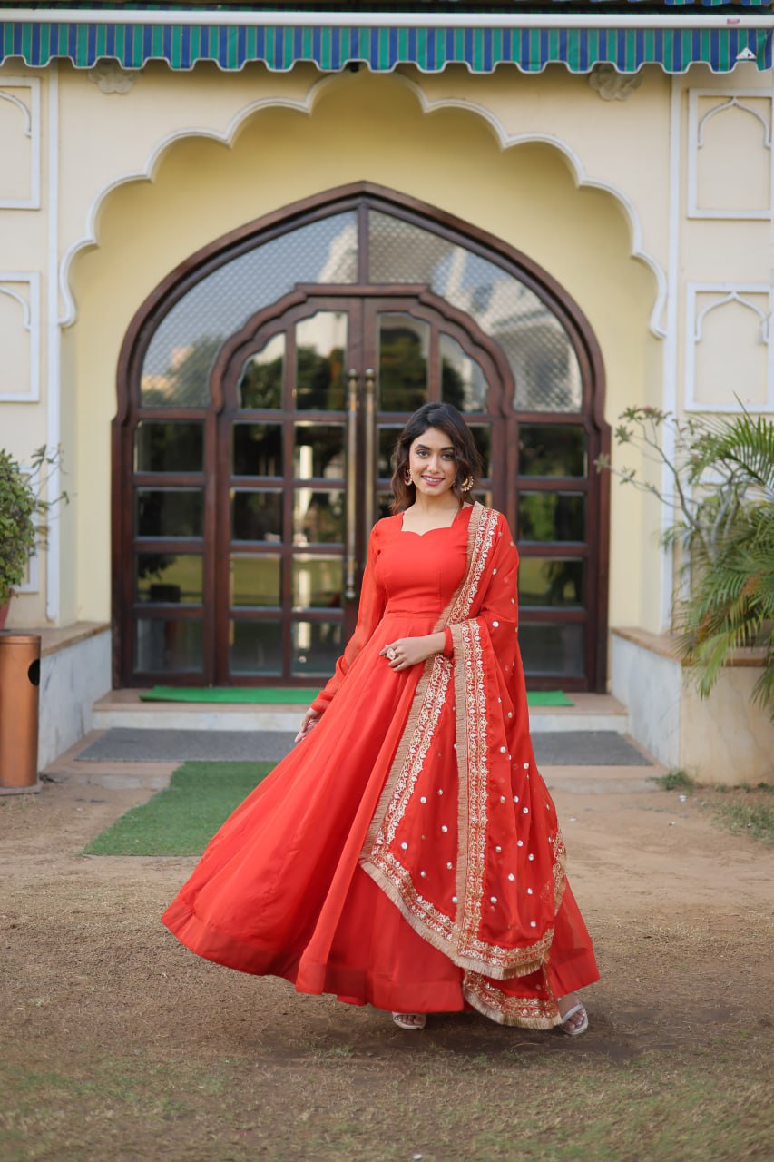 Enchanting Orange Russian Silk Gown-Dupatta Set with Exquisite Sequined Embroidery and Lace Border