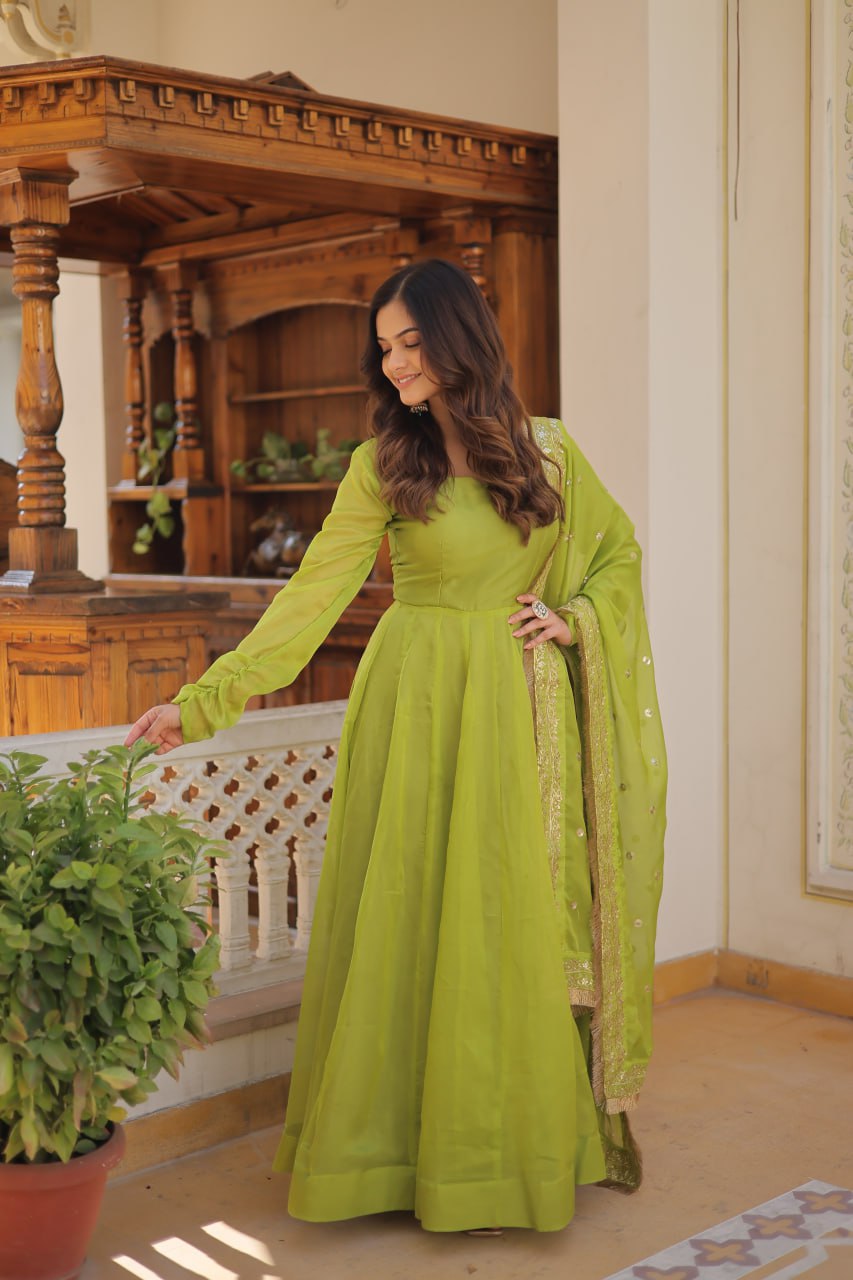 Enchanting Parrot Green Russian Silk Gown-Dupatta Set with Exquisite Sequined Embroidery and Lace Border