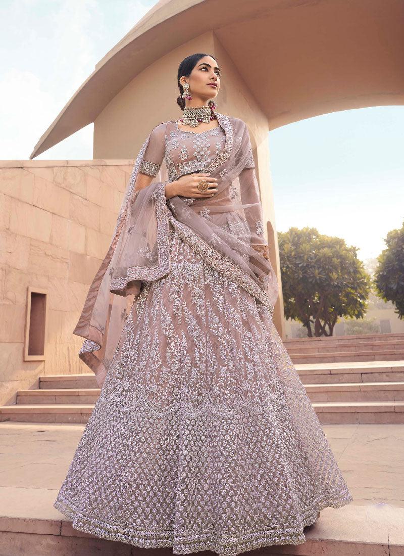 Enthralling Mauve Color Soft Net Base With Sequins Work Lehenga Choli