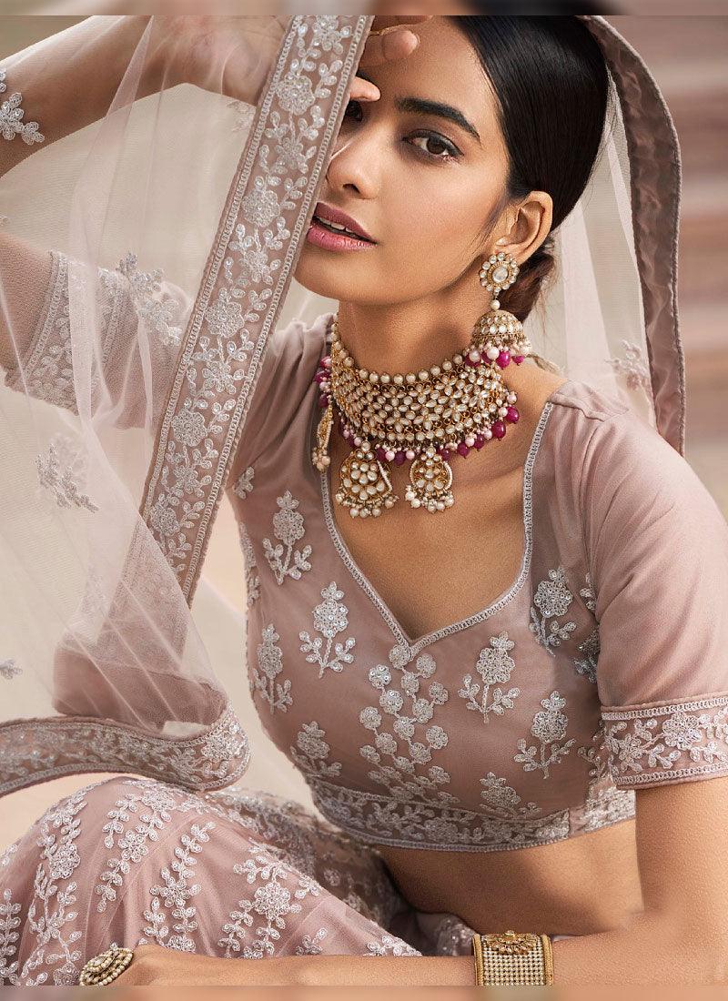 Enthralling Mauve Color Soft Net Base With Sequins Work Lehenga Choli