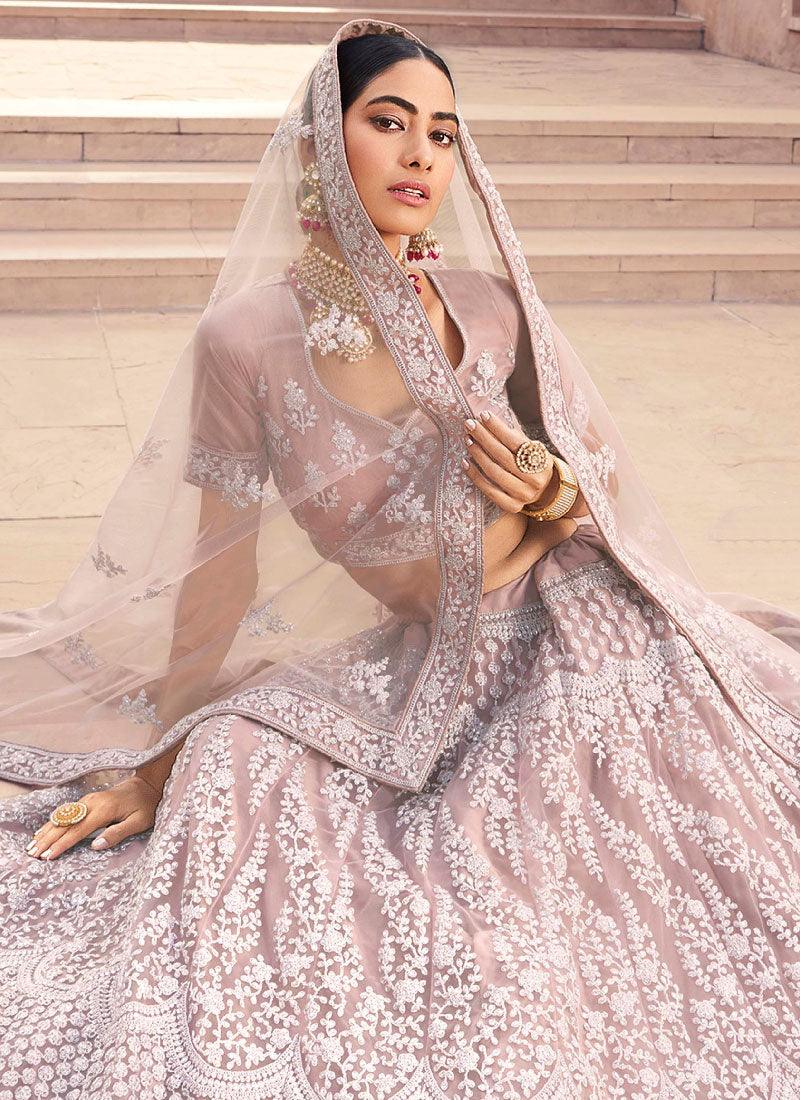 Enthralling Mauve Color Soft Net Base With Sequins Work Lehenga Choli