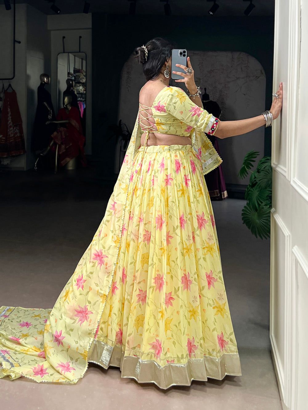 Yellow tubby silk floral printed lehenga choli with mirror work embossed lace detailing