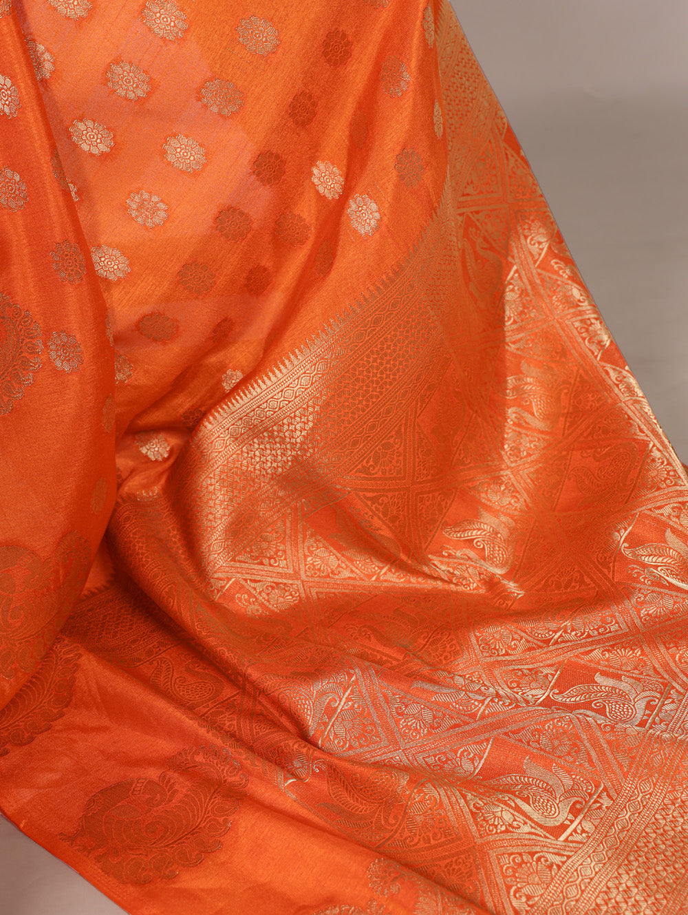 Orange roop silk saree with zari weaving unstitched blouse with lace