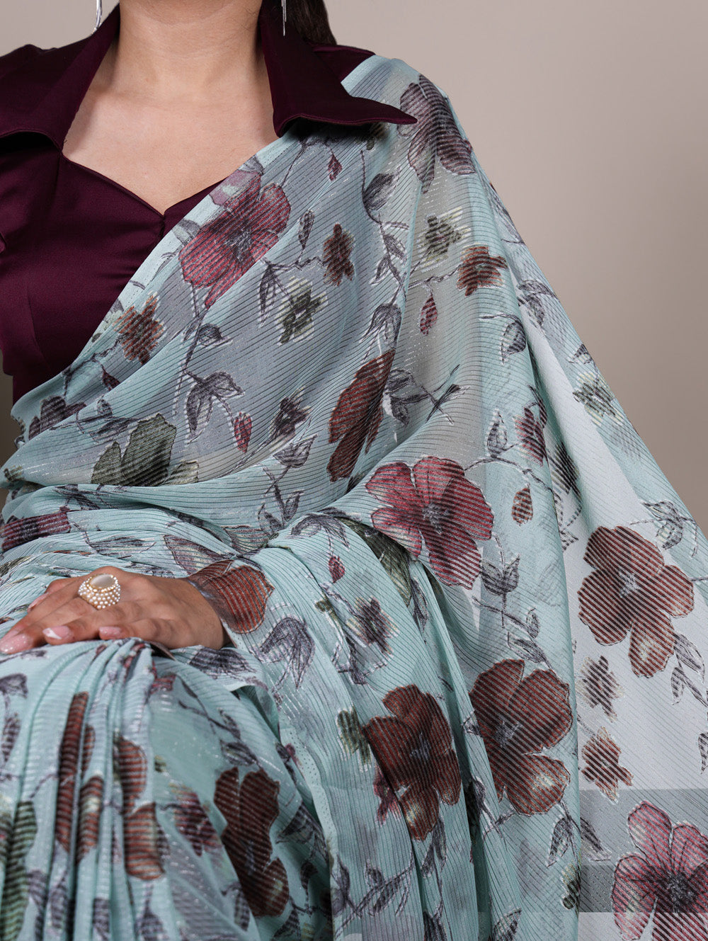 Sea green floral lurex brasso saree with natural silk blouse
