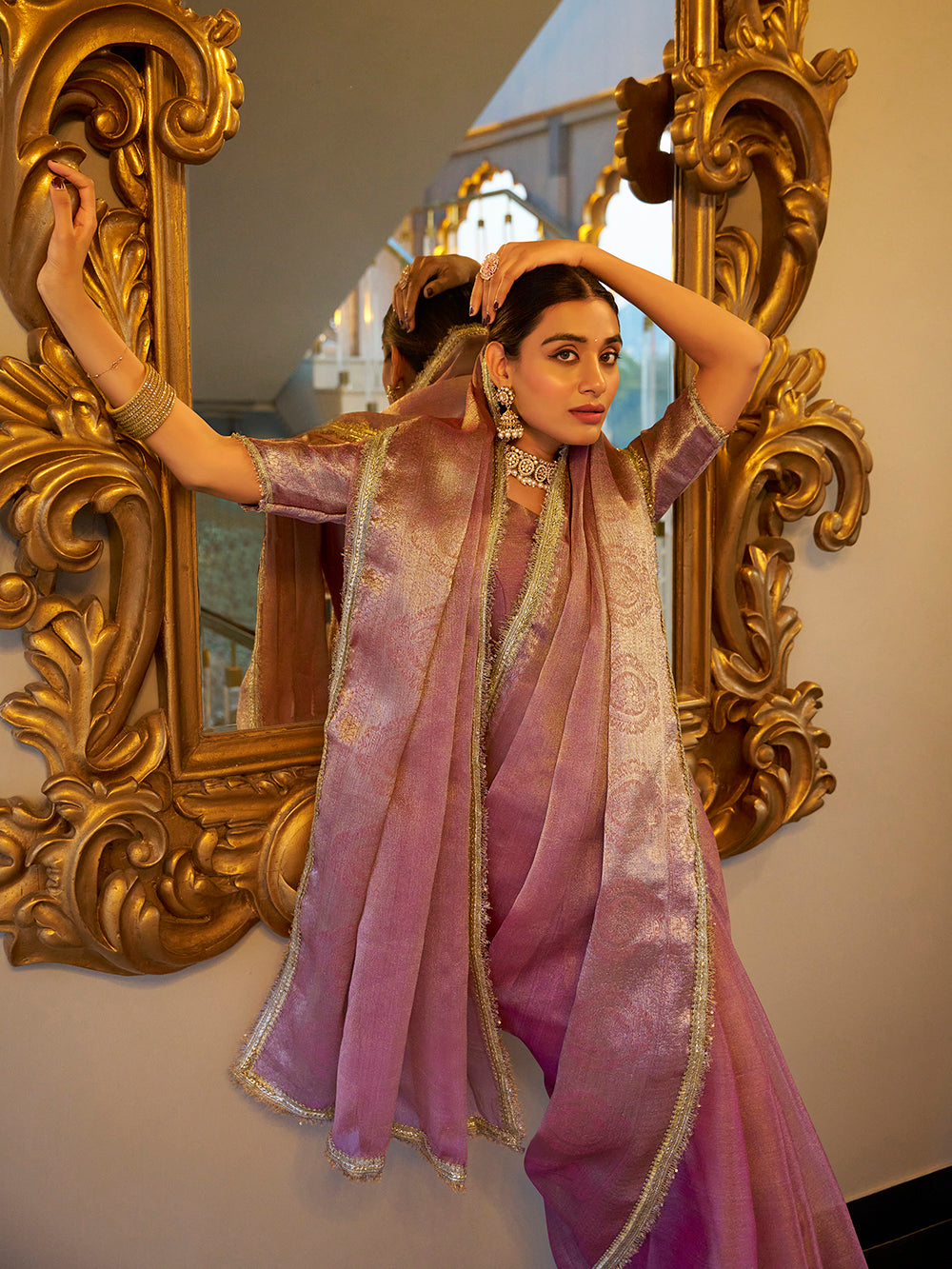 Light pink zari weaving tissue shimmer saree with sequins lace border