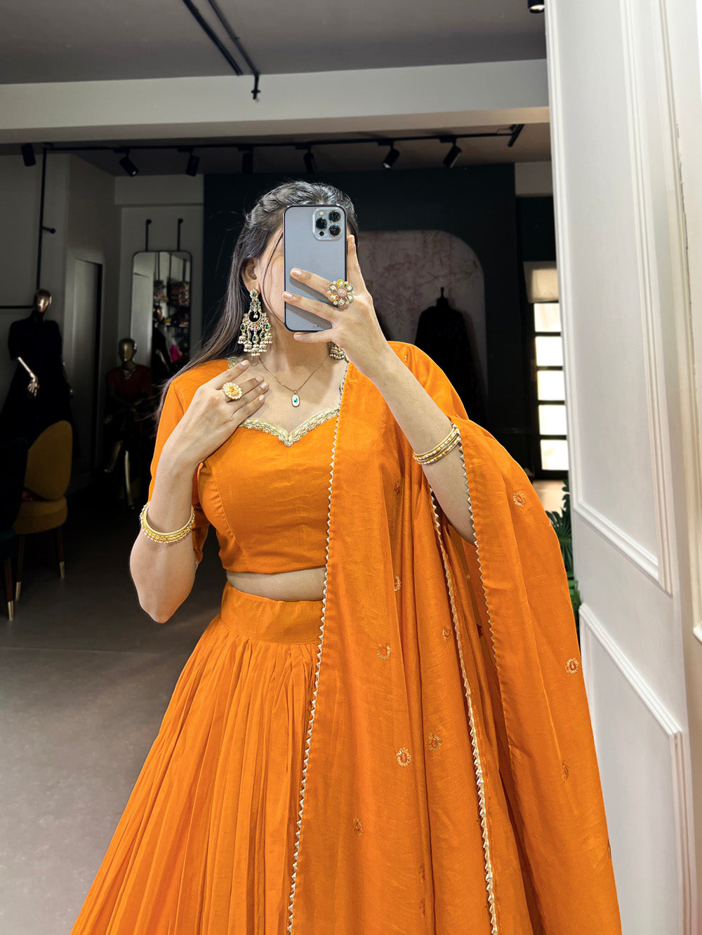 Vibrant orange chanderi silk lehenga choli with zari weaving matching dupatta