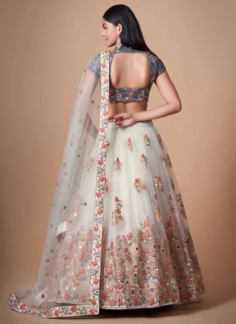 Fashionable net lehenga with dori and mirror work embroidery in off white