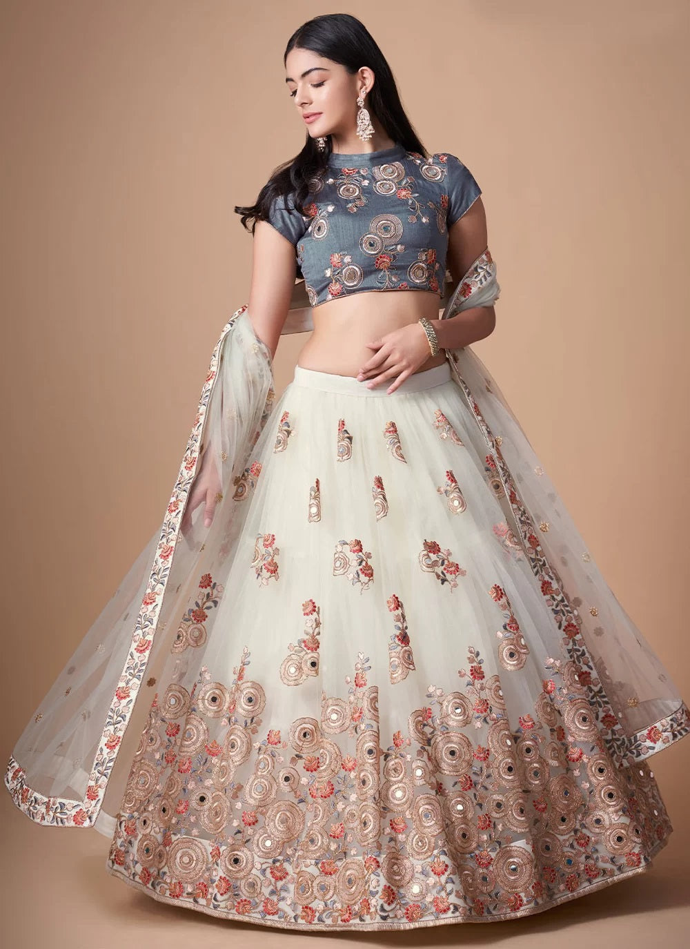 Fashionable net lehenga with dori and mirror work embroidery in off white