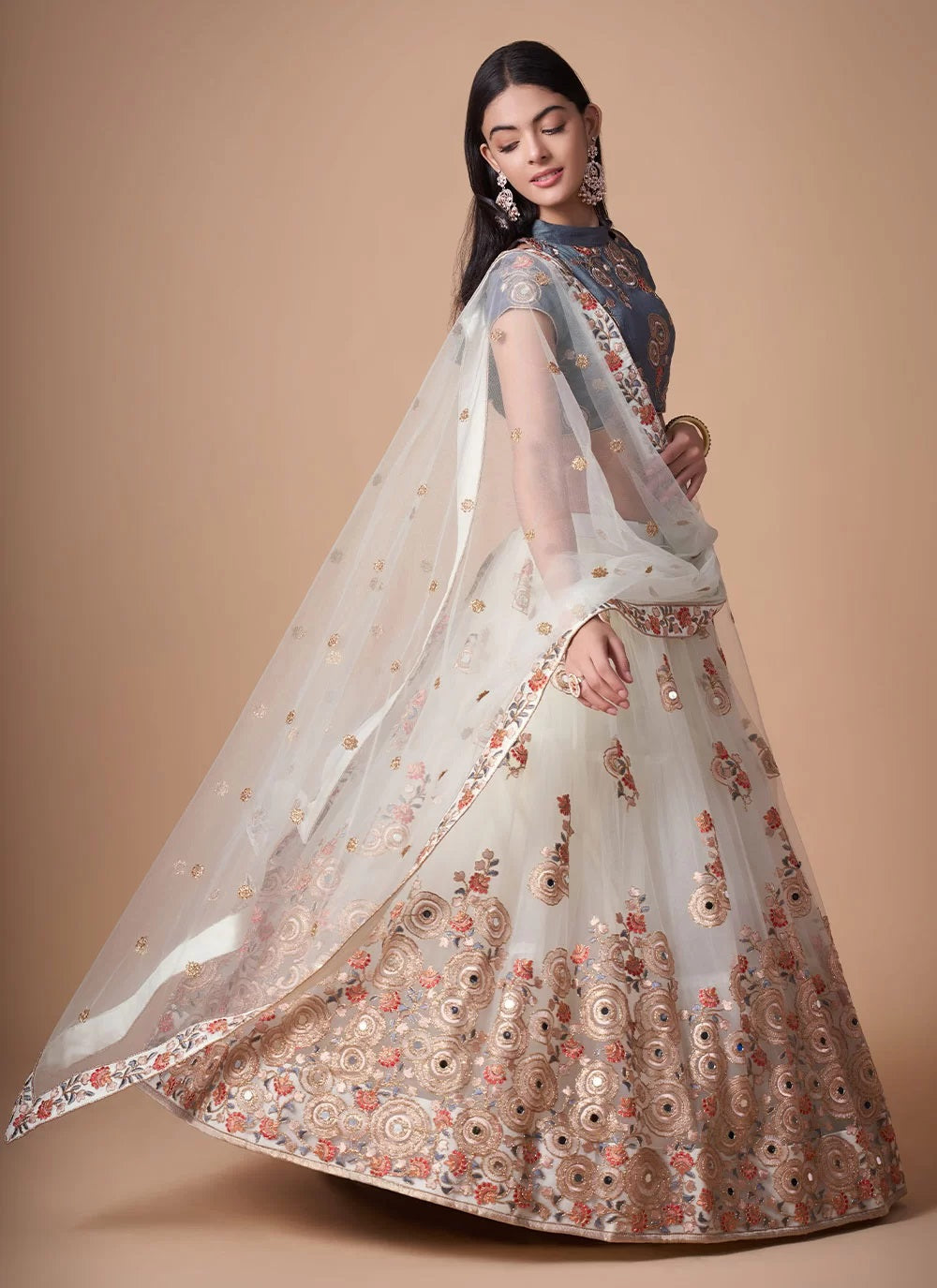 Fashionable net lehenga with dori and mirror work embroidery in off white