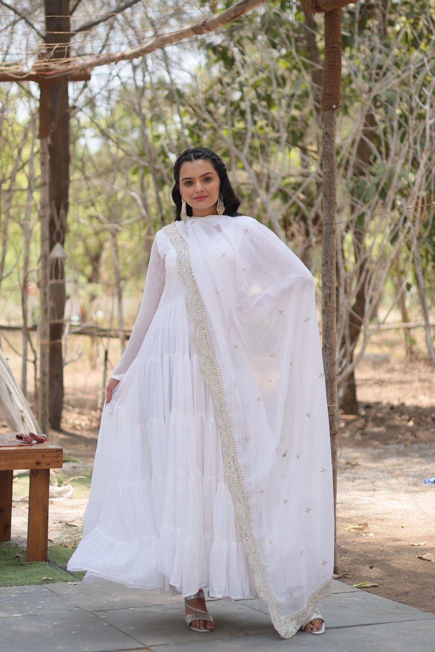 Faux Georgette White Gown with Cascading Frills and Sequin Dupatta